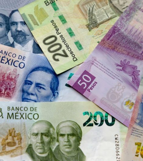 Several Mexican Banknotes of different currencies. Concept: Inflation volatility